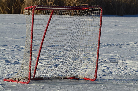red and white goal net in snowfield thumbnail