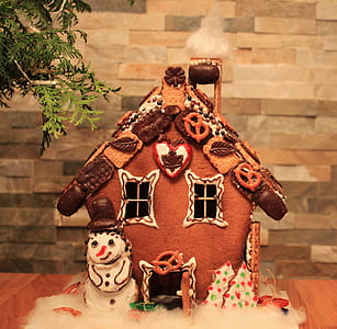 gingerbread house on brown surface thumbnail