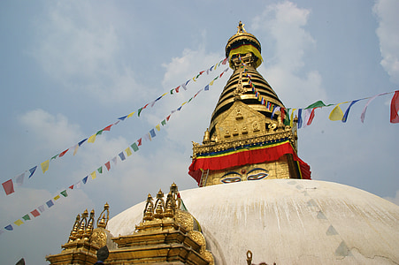 beige and gold domed structure with buntings thumbnail