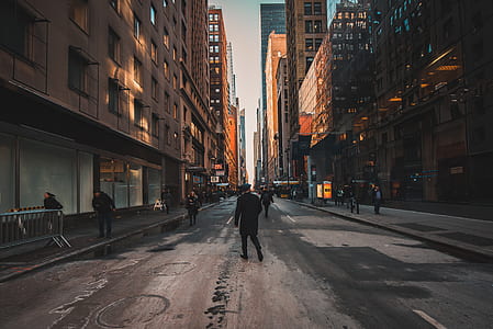 people standing near buildings thumbnail