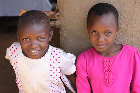 two girls sitting taking group picture thumbnail