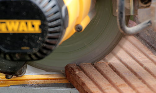 close-up photography of DEWALT cutting power tool thumbnail