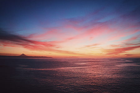 landscape photography of sea water during sunset thumbnail