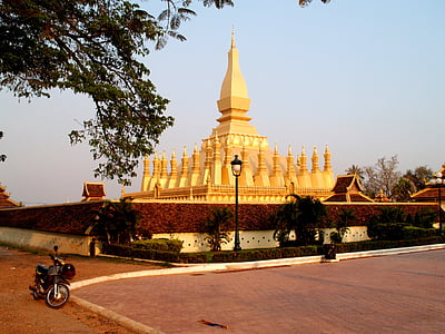motorcycle parked near temple thumbnail