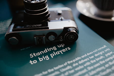 Old analog camera and photography book thumbnail