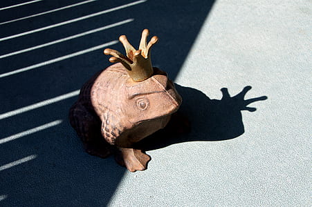 brown ceramic frog figurine thumbnail