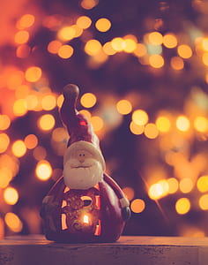 Red and White Ceramic Santa Claus Figurine thumbnail