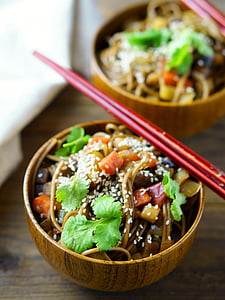 bowl of noodles with sesame seeds thumbnail