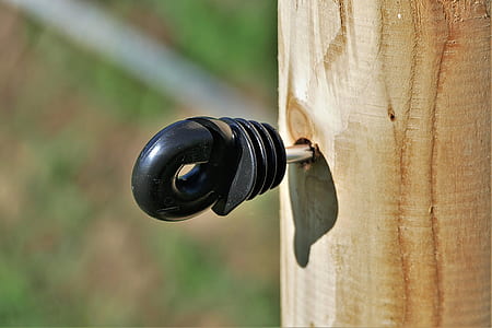 black tool on brown lumber thumbnail