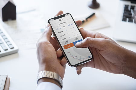 person holding iPhone X thumbnail