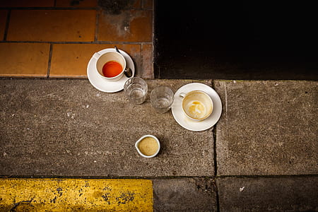 glass and ceramic cups on the ground thumbnail