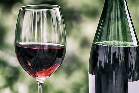 wine bottle and clear wine glass thumbnail