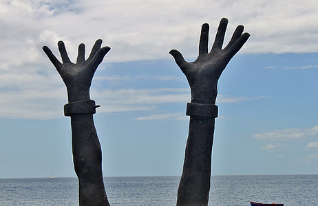 person racing arms during daytime thumbnail