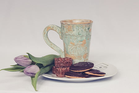 cookie and teacup on plate with flower thumbnail