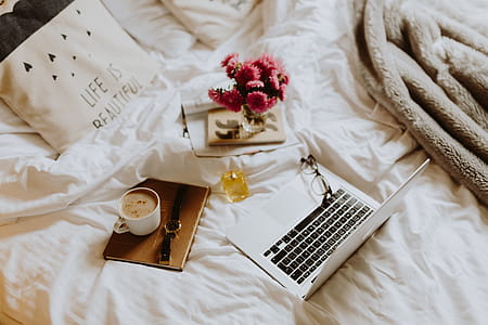 Morning coffee in bed. Working in bed thumbnail