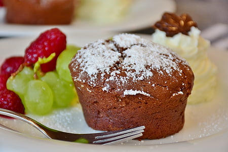 cupcake, grapes, and strawberry on plate thumbnail