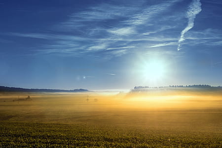 landscape photo of brown land during daytime thumbnail