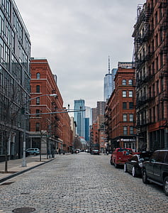 parked near building during daytime thumbnail
