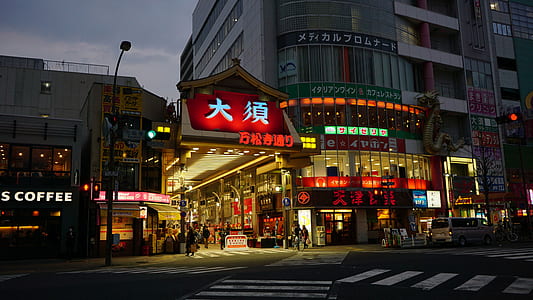 people standing on lighted building thumbnail