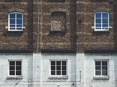 brown and white concrete building thumbnail