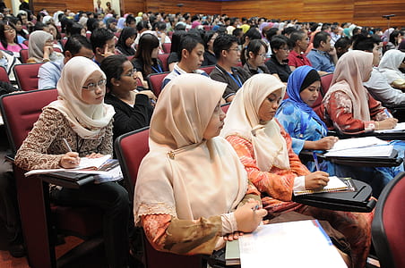 photo of students jotting down notes during class thumbnail