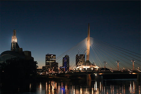 bridge near buildings at dusk thumbnail
