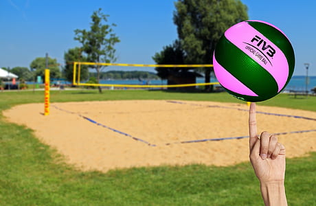 purple and black ball under sunny sky thumbnail