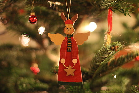shallow focus photo of angel hanging decor thumbnail