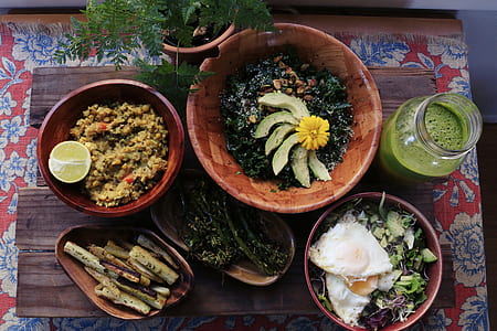 bowls of vegetable salads on brown tray thumbnail