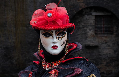 woman wearing red and white masqueraded mask thumbnail