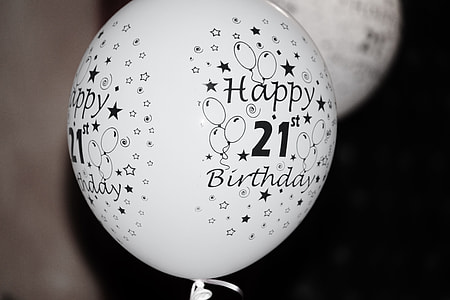 white and black happy 21st birthday printed balloon close-up photography thumbnail