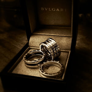 three silver-colored Bvlgari rings with box in til shift photography thumbnail