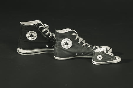 three unpaired Converse All-Star high-tops thumbnail