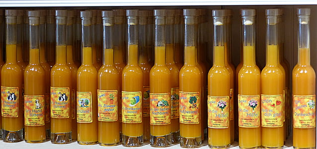 yellow-and-black labeled glass bottle lot thumbnail