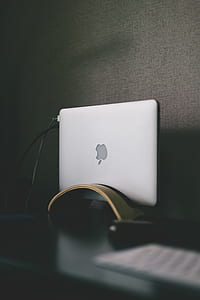 white MacBook on gray surface thumbnail