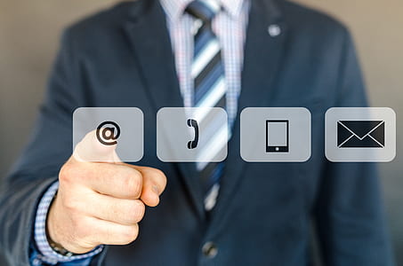 photo of man tapping @ button thumbnail
