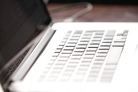 closeup photo of opened MacBook Pro thumbnail