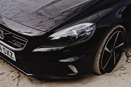 black Volvo vehicle in close-up photo thumbnail