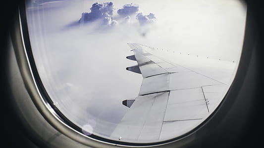 airplane flying at daytime thumbnail