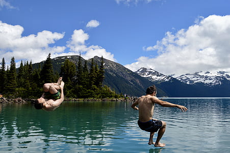 two man jump in water thumbnail