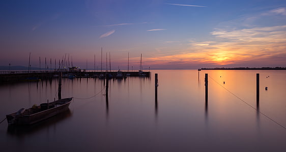 brown wooden boat and body of water thumbnail