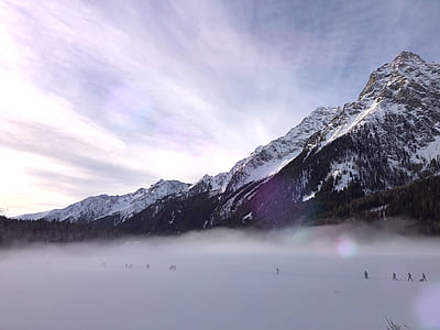 people walking on snow field thumbnail