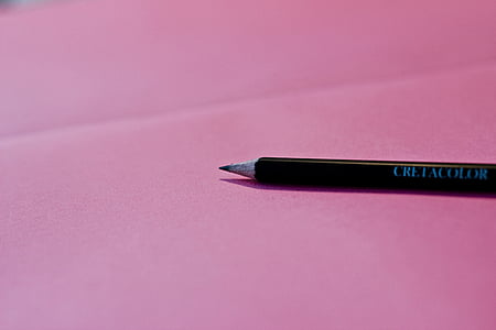 black pencil on pink surface thumbnail