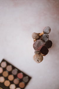 shallow focus photo of assorted makeup brushes thumbnail