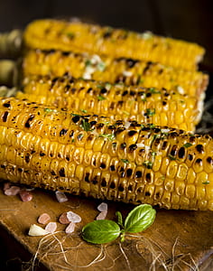 four grill corns on brown tray thumbnail
