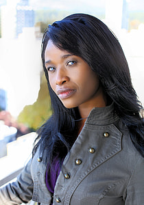 woman in gray coat thumbnail