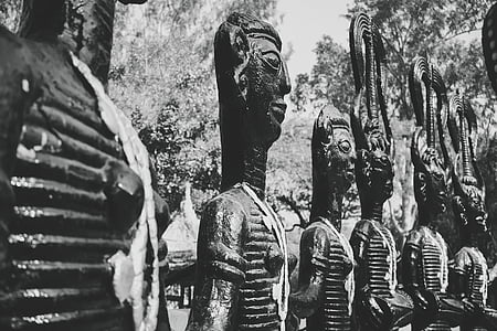 grayscale photography of ancient statues thumbnail