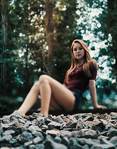 woman sitting on land thumbnail
