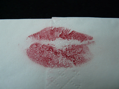 red lips mark on white paper thumbnail