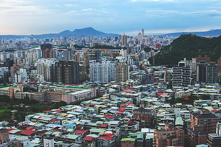 aerial view of buildings and houses during daytime thumbnail